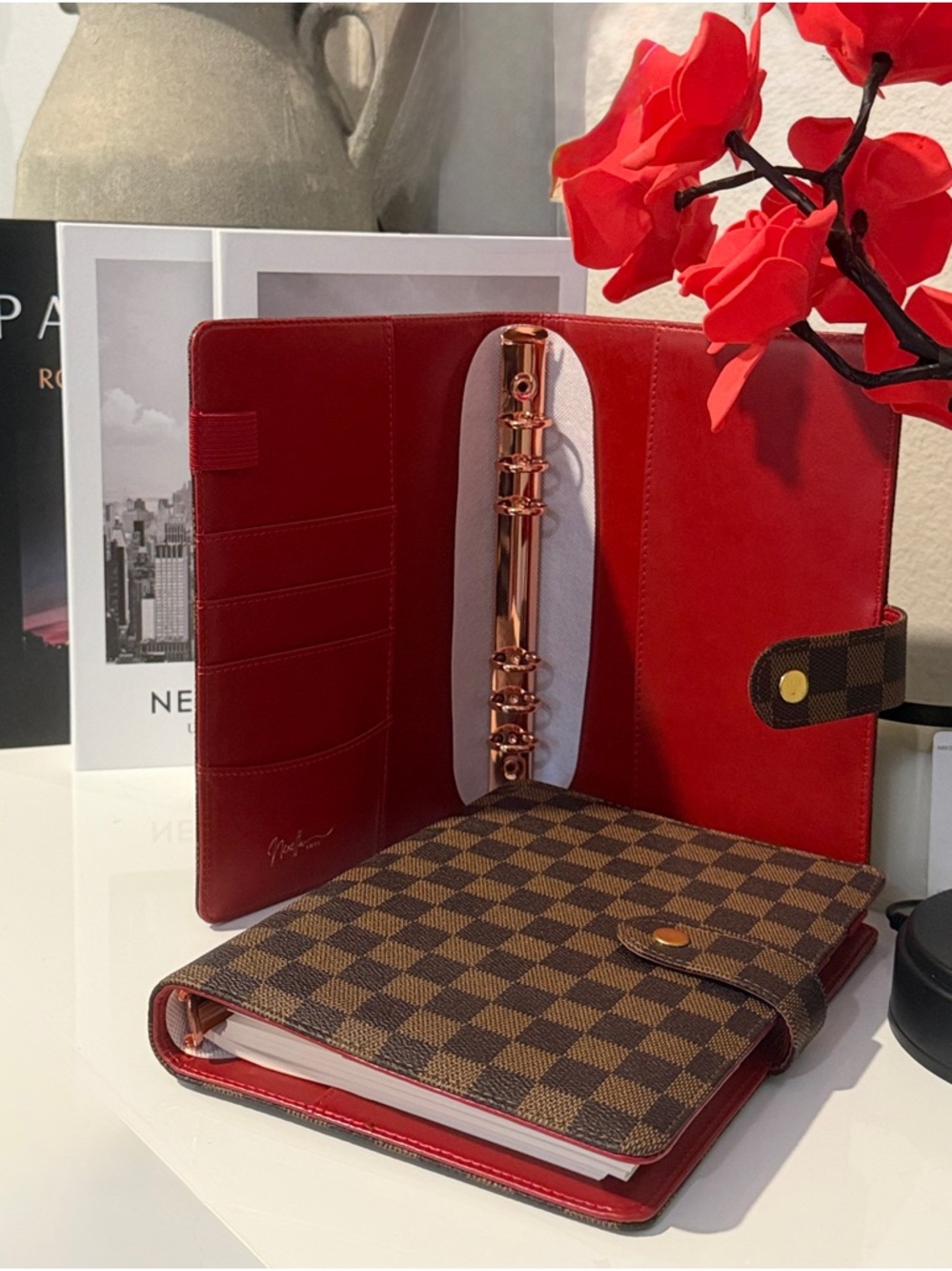 Checkered Brown and Black A5 Planner Cover with Red Interior and Snap Closure.